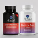 Two bottles of Dr. Emil Nutrition supplements on a gray background