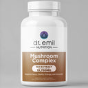 Dr. Emil Nutrition Mushroom Complex supplement bottle on a gray background