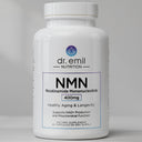 Supplement bottle labeled 'dr. emil nutrition NMN' on a gray background