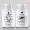 Two bottles of Dr. Emil Nutrition NMN supplements on a gray background