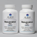Two bottles of Dr. Emil Nutrition Resveratrol Plus on a gray background