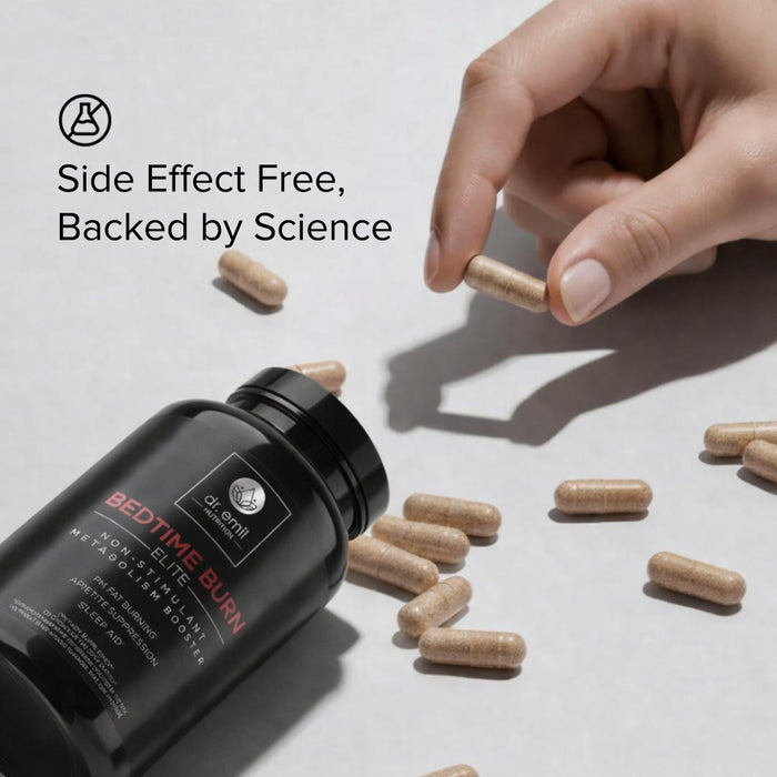 Hand holding a supplement capsule with 'Dr. Mercola' bottle and scattered capsules on a light background.