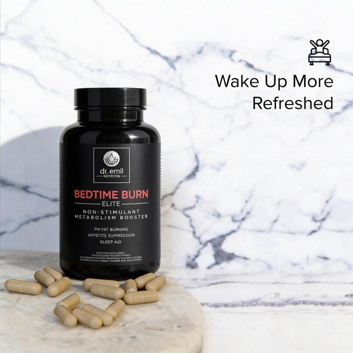 Black bottle of 'Dr. Emil Bedtime Burn Elite' supplement with pills on a marble surface.