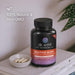 Dr. Emil Nutrition Bedtime Burn supplement bottle with capsules on a table.