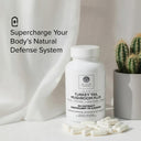 Supplement bottle labeled 'Elite Turkey Tail Mushroom Plus' with capsules on a neutral background.