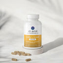 Bottle of Dr. Emil Nutrition Lion's Mane supplement with capsules on a white background