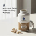 Dr. Emil Nutrition Mushroom Complex supplement bottle with capsules on a light background
