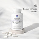 Dr. Emil Nutrition Spermidine supplement bottle with capsules on a light gray background